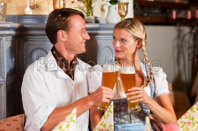 Bavarian Couple drinking wheat beer