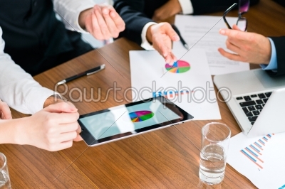 Business - Businesspeople working with tablet Computer