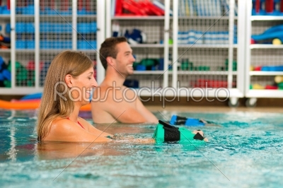 Couple exercising Aquarobics