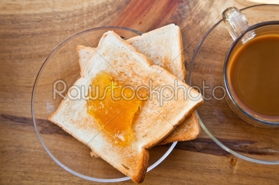 Honey on toast with coffee with milk