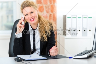 Lawyer in office sitting on the computer