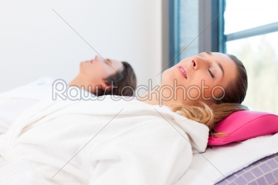Wellness - man and woman relaxing after sauna