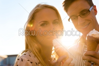 Woman and man eating an ice cream 