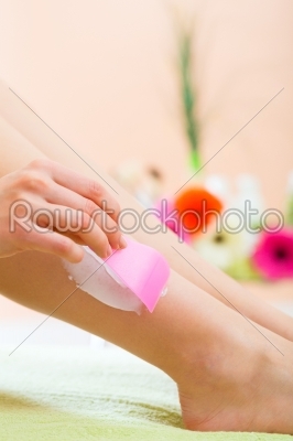 Woman in Spa getting a hair removal