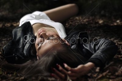 woman lying on the grass
