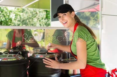 Young emloyee of an concession stand