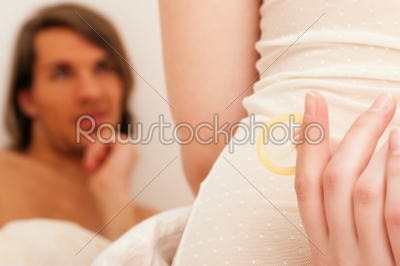 Attempting sex using a condom