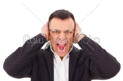 businessman with glasses in suit holding head