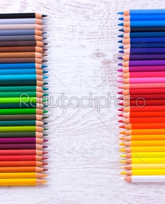 Colour pencils on white table