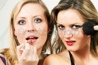 Friends doing make-up