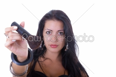 girl shows brush makeup