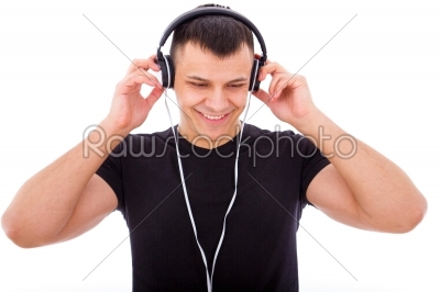 handsome boy listening to music with headphones