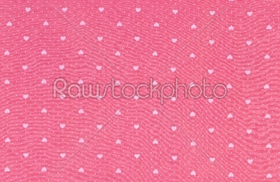 Hearts pattern on fabric texture background.