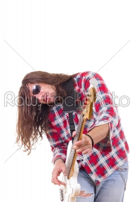 male musician with face expression playing electric bass guitar