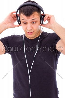 man surprised by something unexpected on headphones