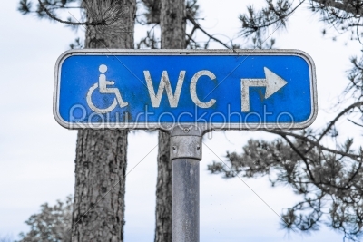 Outdoor toilet sign in blue color